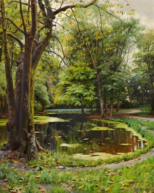 A lake in a park with chestnut trees